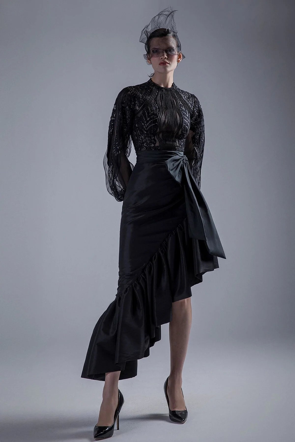 High neck beaded bodice with ruffled skirt ruffled skirt detail